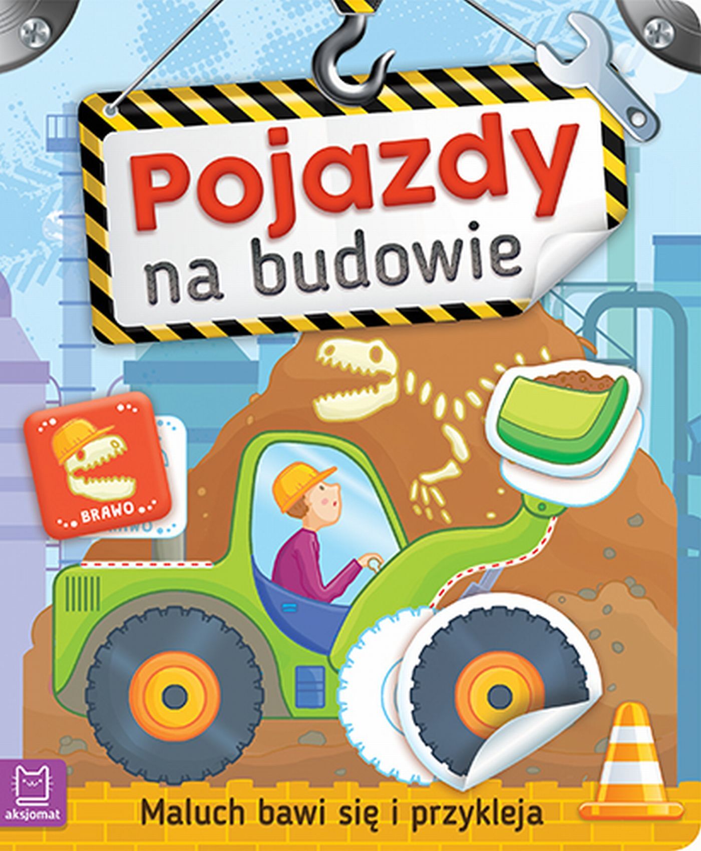 Maluch bawi się i przykleja. Pojazdy na budowie