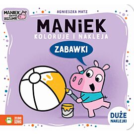 Maniek koloruje i nakleja. Zabawki