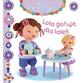 Lola gotuje dla lalek. Mała dziewczynka