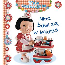 Nina bawi się w lekarza. Mała dziewczynka