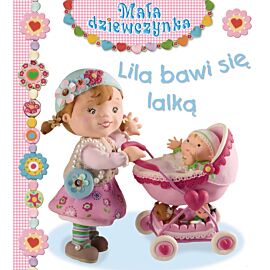 Lila bawi się lalką. Mała dziewczynka